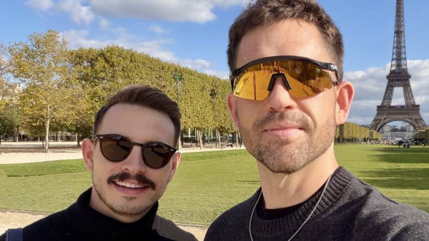 Andrew Curry and Dylan Cunningham selfie at Eiffel Tower in Paris wearing sunglasses on sunny day at Champ de Mars